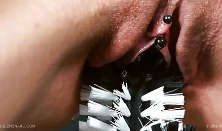Mistress with asian sex games a tattoo on his body, driving a bolt of fat into the vagina of the girl dressed in black
